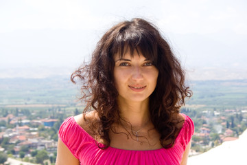 Beautiful woman tourist in Pamukkale, Turkey