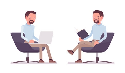 Smart casual man sitting in armchair