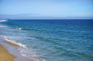 coastline with blue ocean and sand