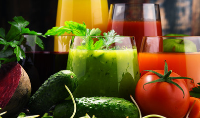 Glasses with fresh organic vegetable and fruit juices