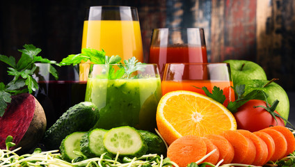 Glasses with fresh organic vegetable and fruit juices