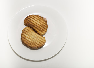 Isolated hot sandwiches on white plate