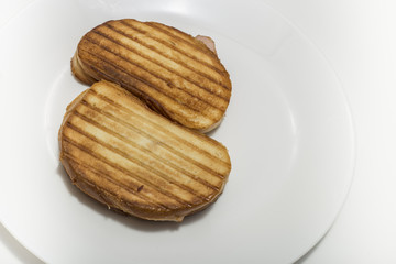 Isolated hot sandwiches on white plate