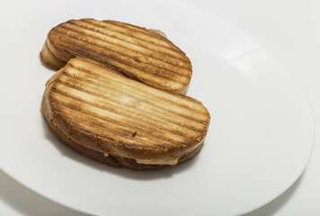 Isolated hot sandwiches on white plate