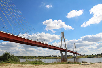 Summer landscape with a view of the cable-stayed bridge on the river Oka, Murom, Russia.