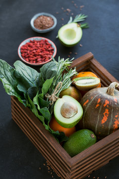 Healthy farmer organic food: fruit, vegetables, seeds, superfood, leaf