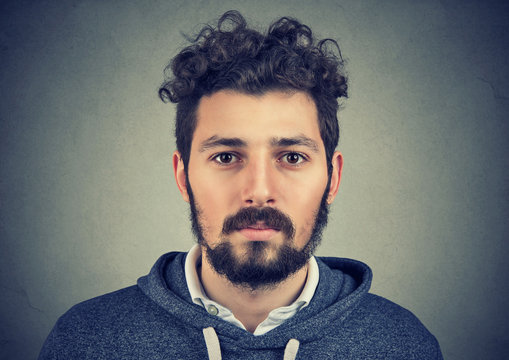 Portrait of a beard man with serious face expression