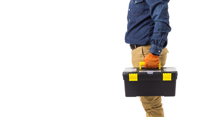 Portrait of repairman (builder) in helmet and with tool box in hands isolated on white background. Copy space