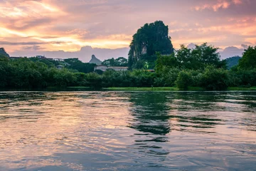 Foto op Aluminium Sunset scene in Guilin, China, with stunning rock formation © creativefamily