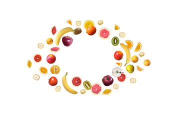 Different fruits lie in a circle on white background