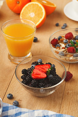 Rich breakfast on natural wooden table