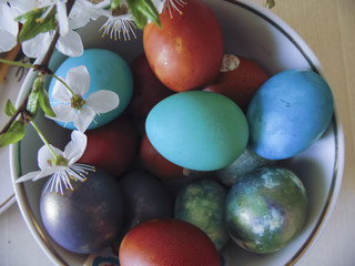 Some colorful eggs in a plate for the Easter