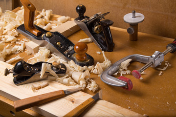 carpenter tools in pine wood table