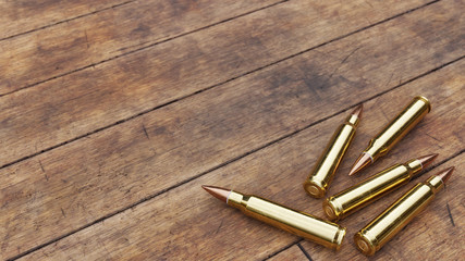 Rifle Ammunition on Old Wooden Boards