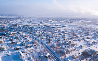 Fototapeta na wymiar Aerial winter view of Kiruna, the northernmost town in Sweden, province of Lapland, winter sunny picture shot from drone