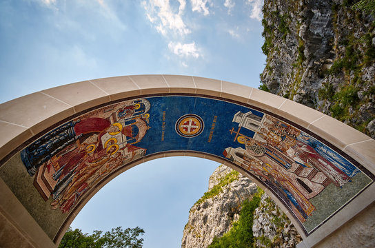 Arch decorated with religious scenes above the gate of Monastery in Ostrog, Motenegro.