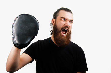 Martial arts coach screaming with joy.