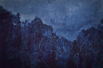 wall texture plaster and cement. old wall. grunge cracks. dark blue twilight mountain background