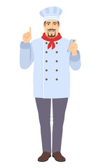 Chef with mobile phone pointing up