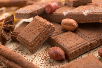Milk chocolate with nuts, and spices. Macro