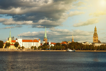 Obraz premium Riga Latvia. View of castle and churches over river Daugava