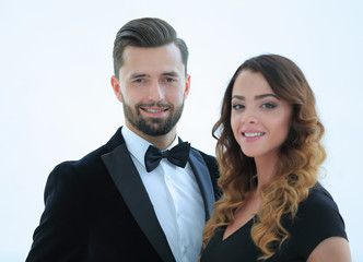 Portrait of a handsome man looking at the camera with a woman