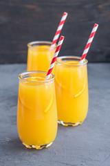 Three glasses of delicious citrus juice