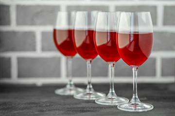 Red sweet wine in the glasses. Concept restaurant, alcohol, party.