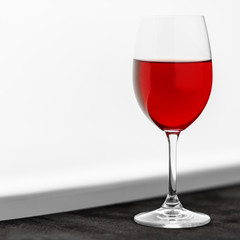 A glass of red french wine. Concept restaurant, alcohol, party.