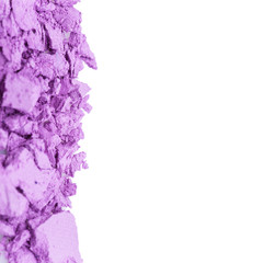 Crushed eyeshadows on white background