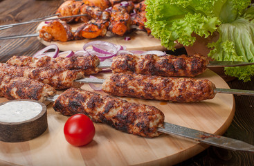 Raw barbecue shish kebabs - grilled meat