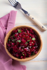 Healthy vegetarian or vegan beetroot, garlic, cilantro and olive oil salad. View from above, top, overhead