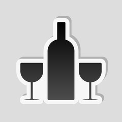 glasses and bottle. Sticker style with white border and simple shadow on gray background