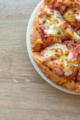 Delicious italian pizza served on wooden table