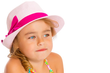 Little girl in a hat.