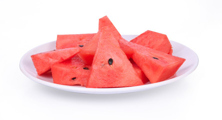 Sliced ripe watermelon isolated on white plate