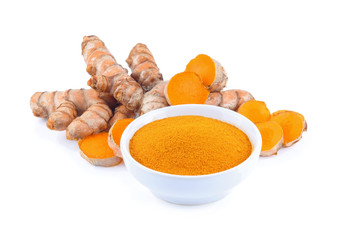 Turmeric roots and turmeric powder isolated on white background