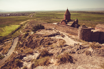 Fortified Khor Virap Monastery on hillock. Exploring Armenia. Armenian architecture. Tourism and travel concept. Religious landmark. Tourist attraction. Copy space for text. Place of worship.