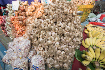 Garlic and banana on market
