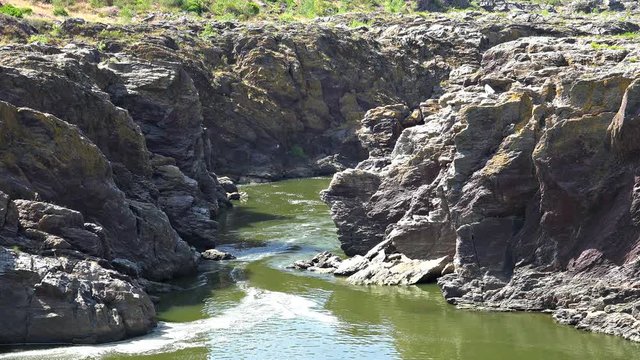 Pulo do Lobo or wolf's leap waterfall and cascade on river Guadiana, Alentejo, Portugal