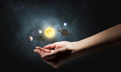 Solar system in hands