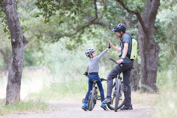 family biking in the park