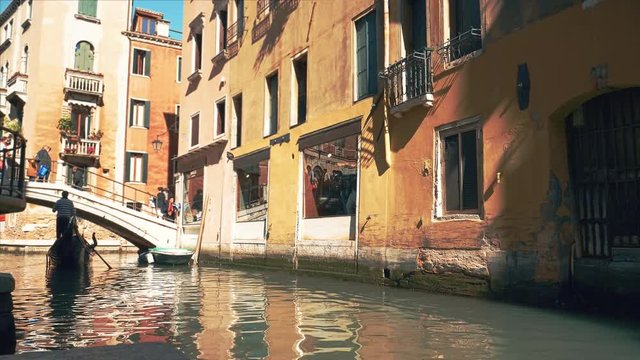 Venetian chanal with gondola in Venice, Italy