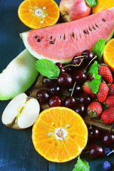 Fresh fruits on wooden background, Healthy diet.