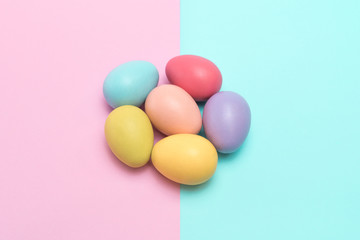colourful easter eggs placed in a flower shape