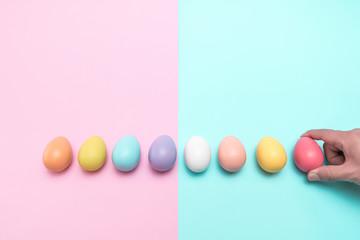 hand holding the red easter egg on the right side