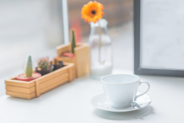 Ceramic coffee cup on the table