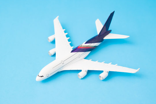 Airplane model on blue color background