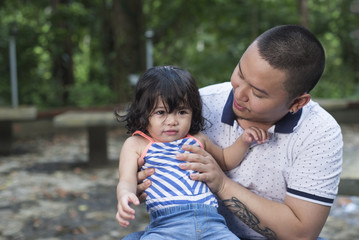 Fototapeta premium Father's Care For A Daughter