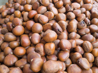 Closeup of chestnuts for sale at the market.